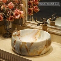 Table ronde moderne en marbre, lavabo de comptoir, lavabo contemporain en céramique pour salle de bain à usage domestique