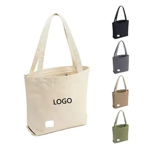 حقيبة كتب قماشية صديقة للبيئة بيضاء للتسوق قطنية كبيرة بطبعة شعار مخصص مع جيب وسحاب