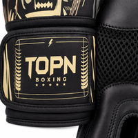 Gants de boxe professionnels noirs et or 8-16oz en cuir PU Nappa avec rembourrage absorbant les chocs pour le soutien du poignet, personnalisables Muay