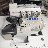 Machine à coudre surjeteuse industrielle japonaise d'occasion Juki-6704s, plateforme plate, avec verrouillage optionnel, caractéristiques clés