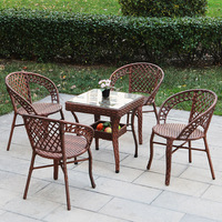 Ensemble de chaises en rotin pour l'extérieur, idéal pour les balcons, les patios et les tables basses.