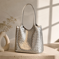 Sac fourre-tout mini tissé argenté pour femme, nouvelle collection été 2026, style niche haut de gamme, sac à bandoulière japonais-coréen pour trajets quotidiens