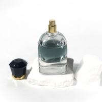 Nouvelle conception de flacon de parfum en verre transparent de 75 ml avec pompe pulvérisatrice, atomiseur, emballage en verre, flacon de parfum vide avec boîte
