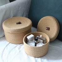 Panier de rangement rond en corde de coton tressée OEM pour la maison, pliable, avec poignées en cuir, joli panier de rangement de bureau avec couvercle