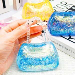 Christmas Glitter Handbag Silicone Squishy Toy Slow Rising Sensory Squeeze Fidget Stress Relief Gift Holiday Party - Product Image 1