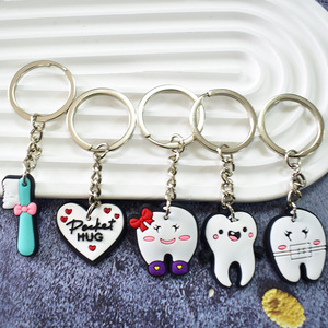 Llavero de PVC con diseño de diente de dibujos animados, venta al por mayor, llavero promocional de metal con diseño de <span class=keywords><strong>dentista</strong></span>, anime, dibujos animados, de <span class=keywords><strong>pegamento</strong></span> blando, con forma de corazón - Product Image 1