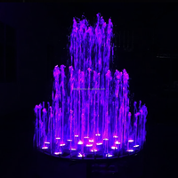 Fontaine combinée en acier inoxydable avec sculpture de lotus et jets LED RGB DMX512 pour projet de place publique emblématique