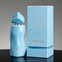 Nouvelle sortie - Flacon de parfum tendance 50 ml, corps incurvé, forme irrégulière, bouchon triangulaire, surface colorée personnalisée, coffret cadeau de luxe