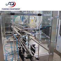 Machine de remplissage de bouteilles à 12 buses, économique et d'occasion, pour l'emballage de produits alimentaires, de boissons et de produits chimiques quotidiens