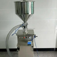 Machine de remplissage et de dosage verticale pour crèmes cosmétiques, sauces, confitures, miel, beurre, onguents, shampoings, liquides et eaux en flacons et seringues
