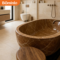 Baignoire ovale autoportante en marbre brun veiné blanc, base foncée polie, pour salle de bain moderne et luxueuse