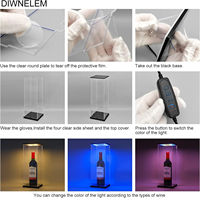 Vitrine de bouteille de vin en acrylique personnalisée avec lumière LED pour le vin rouge et le whisky
