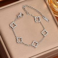 Bracelet pour Femme en Acier Inoxydable, Trèfle à Quatre Feuilles avec Fleur Découpée Ornée de Diamants