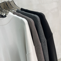 T-shirt unisexe en cachemire crème haute élasticité à col montant et manches longues, collection Automne Hiver 2026, style Old Money minimaliste, hauts neutres pour superposition