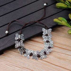 Vente en gros de bracelets en alliage plaqué argent thaïlandais antique avec cœur d'éléphant tissé à la main pour hommes et femmes - Product Image 6