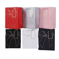 Sac en papier blanc de luxe avec gaufrage, estampage à chaud et impression offset |   Recyclable