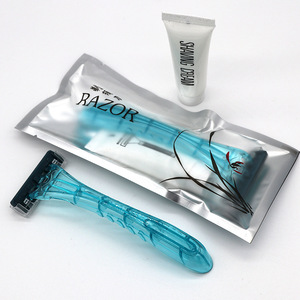 Set de afeitado con crema, mango de plástico desechable para uso en hoteles - Product Image 1