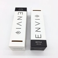 Caja de embalaje de bálsamo labial en relieve de estilo moderno con logotipo personalizado para cosméticos