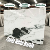 Dalles de marbre blanc Panda de haute qualité pouvant être utilisées pour les comptoirs de cuisine intérieurs, les sols et les surfaces murales des halls.
