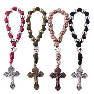 Pulseras de <span class=keywords><strong>Rosario</strong></span> metálicas coloridas, Cruz católica de Jesucristo, cuerda de paraguas, cuentas de oración tejidas, joyería cruzada - Product Image 1