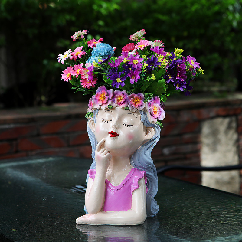 Pot de fleur fille méditation-rose