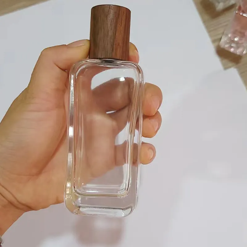 Botella de cristal cuadrada para Perfume, cubierta de madera con fragancia transparente, con caja de presentación