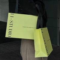 Vente de gros Personnalisez votre propre logo Sacs en papier vert avec impression écologique pour les magasins de luxe