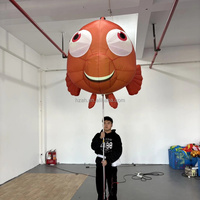 Grand ballon publicitaire gonflable en forme de poisson tropical en tissu Oxford avec lumière LED et taille personnalisée pour défilé et spectacle