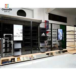Modern Stainless Steel Clothing <b>Display</b> Racks | <b>Wall</b>-Mounted & Island Garment <b>Cabinets</b> | Custom Boutique Retail Fixtures - Product Image 5