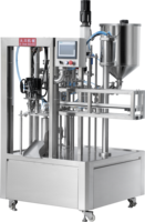 Machine de remplissage et de bouchage à double voie pour sachets souples avec bec verseur pour boissons, liquides, crèmes, jus, lait, lait de soja jusqu'à 500 ml