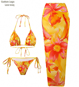 Traje <span class=keywords><strong>de</strong></span> <span class=keywords><strong>baño</strong></span> <span class=keywords><strong>de</strong></span> 3 piezas con estampado floral para mujer, detalles <span class=keywords><strong>de</strong></span> lazos, conjunto básico <span class=keywords><strong>de</strong></span> <span class=keywords><strong>Bikini</strong></span> y falda, traje <span class=keywords><strong>de</strong></span> <span class=keywords><strong>baño</strong></span> brasileño, venta al por mayor, logotipo personalizado - Product Image 1