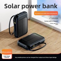 Chargeur portable solaire en plastique 20 000 mAh avec câble intégré, logo personnalisable, sortie 10W, idéal pour les cadeaux - Vente en gros transfrontalière