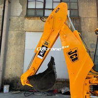 Chargeuse-pelleteuse sur pneus JCB 4CX d'occasion avec déplacement latéral, moteur 4.4L et boîte de vitesses, garantie 1 an