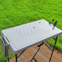 Table à poisson blanche portable au design moderne pour nettoyer les légumes à poisson à l'intérieur