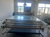 Machine de presse à chaud Pengda rouleau à rouleau de 1800MM d'occasion Machine de transfert textile pour tissu PD-1800D-600 2 ans pour impression par sublimation