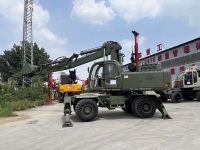 Excavatrice sur pneus d'occasion YH-210-E avec moteur Cummins et boîte de vitesses - Garantie 1 an, capacité de la benne de 0,9 m³, poids de 21 000 kg
