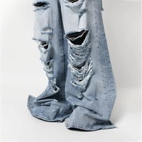 Jeans larges déchirés OEM ODM pour hommes, avec trous éclatés aux fesses, en denim délavé bleu glace, coupe ample et usée