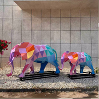 Statue de tête d'éléphant personnalisée en acier inoxydable avec relief en métal poli avec un style Feng Shui pour installation artistique