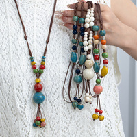 Collier ethnique en céramique de Jingdezhen pour femme, style bohème, ne se décolore pas, nouveau style chinois, chaîne de pull, best-seller