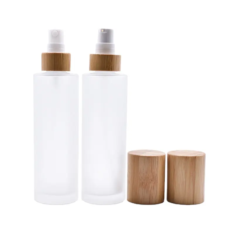 कॉस्मेटिक पैकेजिंग पूरे बिक्री सस्ते Refillable ग्लास तेल स्प्रे इत्र गिलास स्प्रे बोतल बांस टोपी