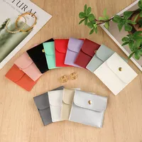 Sacs d'emballage pour bijoux en velours de luxe personnalisés, recyclables, en cuir PU, avec bouton pression en métal, pochette pour bijoux pour emballer des cadeaux