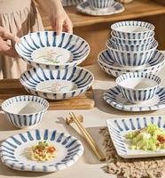 Service de vaisselle en porcelaine peinte à la main, motif orchidée, assiettes et bols rayés bleus, vaisselle sous glaçure pour la maison, les dîners et les fêtes