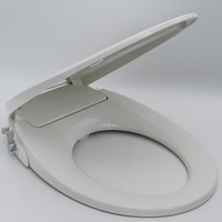 Siège de toilette rond moderne autonettoyant avec double buse Installation facile Lavage arrière et féminin sans câblage Bidet tendance