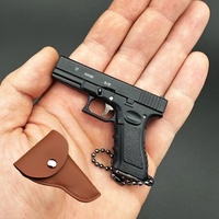 Llavero de pistola de aleación miniatura, modelo de pistola realista de metal, llavero de juguete con funda