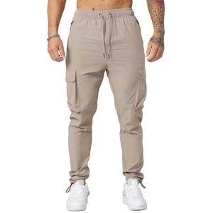 PERPETUAL SOLUTIONS Pantalon de jogging décontracté pour homme en coton vert olive avec cordon de serrage, taille élastique et bas de pantalon à revers, respirant - Product Image 1