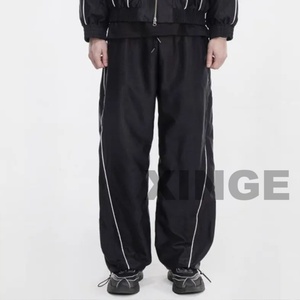 กางเกงลำลองสตรีทแวร์ผู้ชายแบบมีแถบไนลอน ผลิตโดยผู้ผลิตขายส่ง กางเกงทรงหลวมแบบกันลม กางเกงพาราชูท - Product Image 2