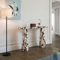 Table console en marbre Calacatta Viola à pieds trapézoïdaux haut de gamme, idéale pour la décoration de maisons de luxe et les entrées d'hôtels de prestige