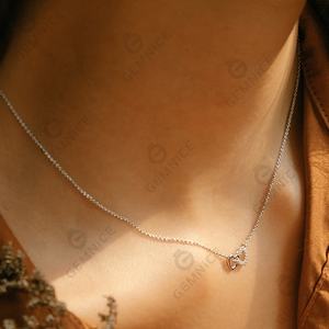 Nuova Collezione Gemnel: Collana con Pendente a Doppio Cuore Intrecciato in Argento 925 Placcato Oro con Diamanti - Product Image 4