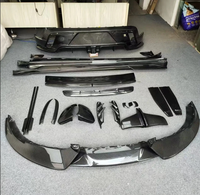 Pièce auto BTC pour Porsche Taycan : Kit carrosserie style MSY, Lame avant, Lame arrière, Jupes latérales, Spoiler en fibre de carbone