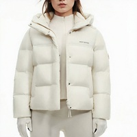 Veste courte matelassée blanche à capuche pour femme, logo brodé, manteau en duvet matelassé, vente en gros